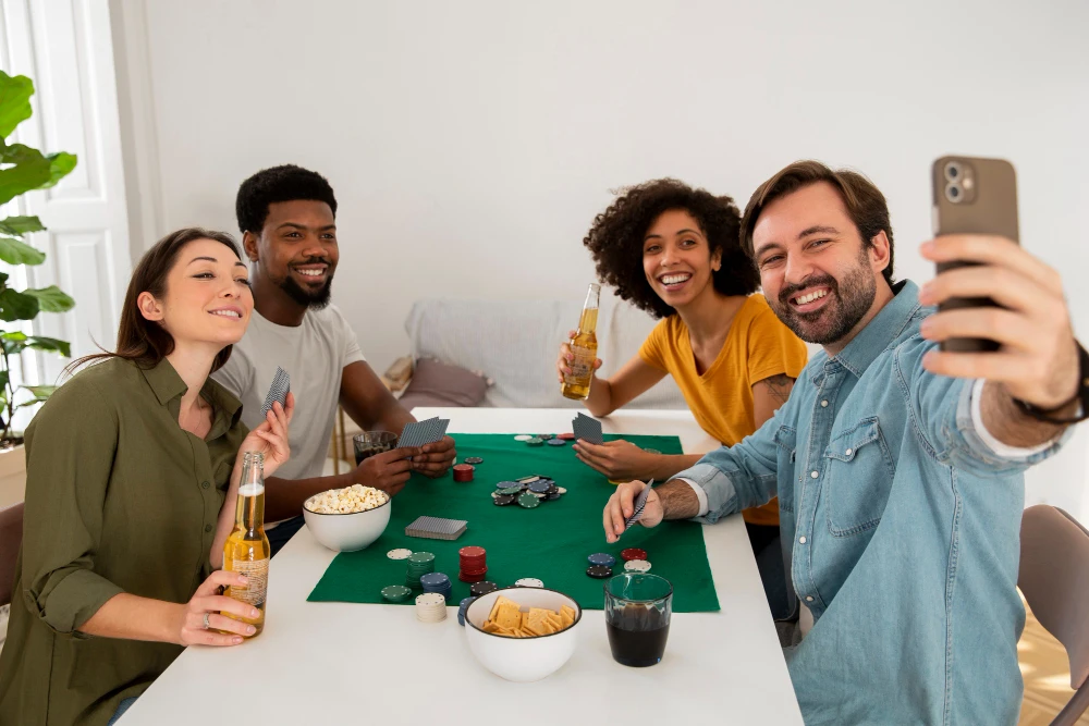 Playing cards and poker chips on green felt
